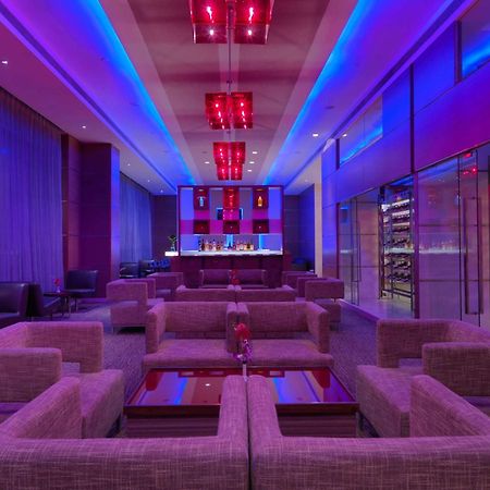 Radisson Blu Hotel, Greater Noida Bagian luar foto The bar at the 101 lounge