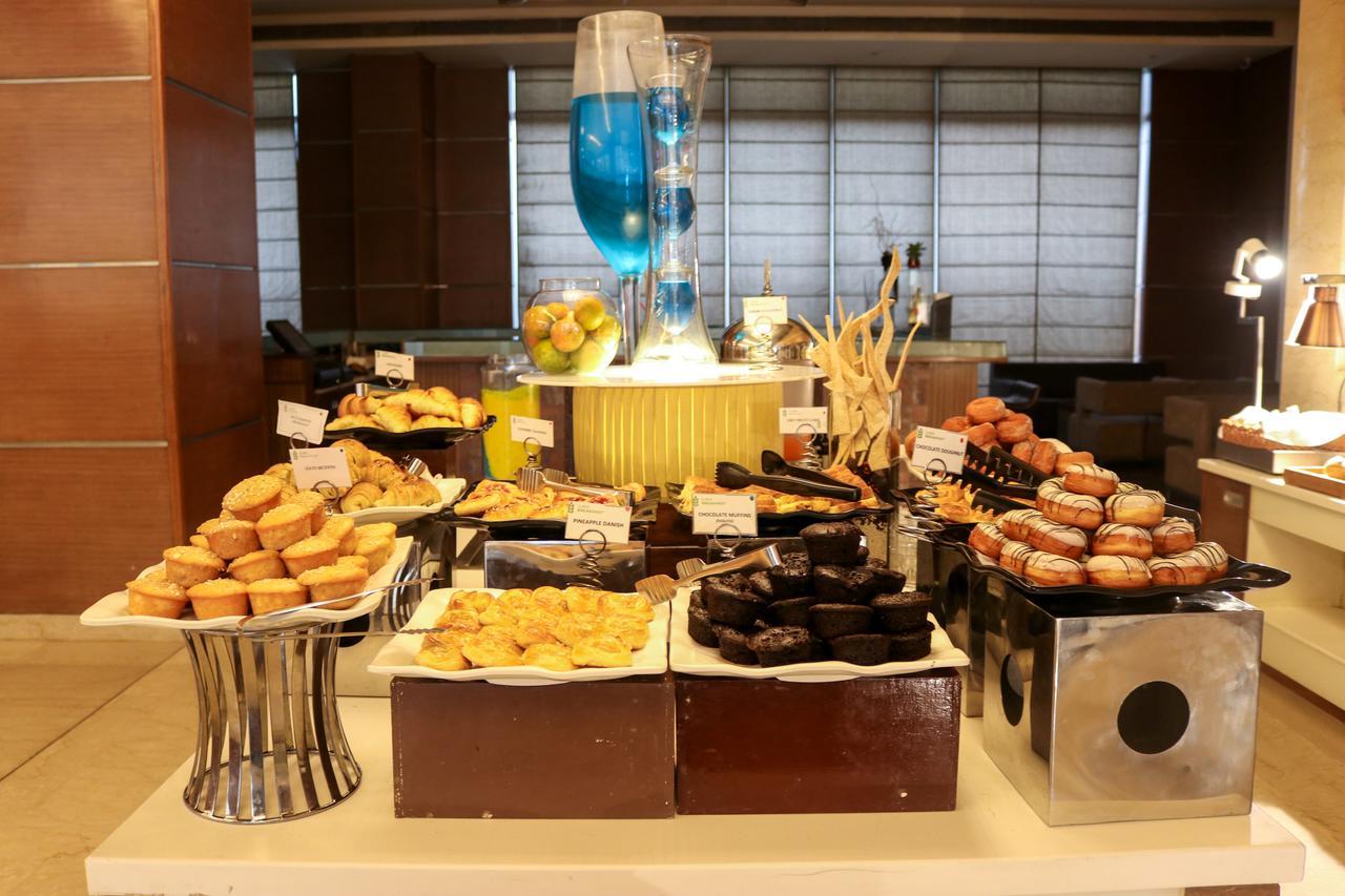 Radisson Blu Hotel, Greater Noida Bagian luar foto A dessert buffet