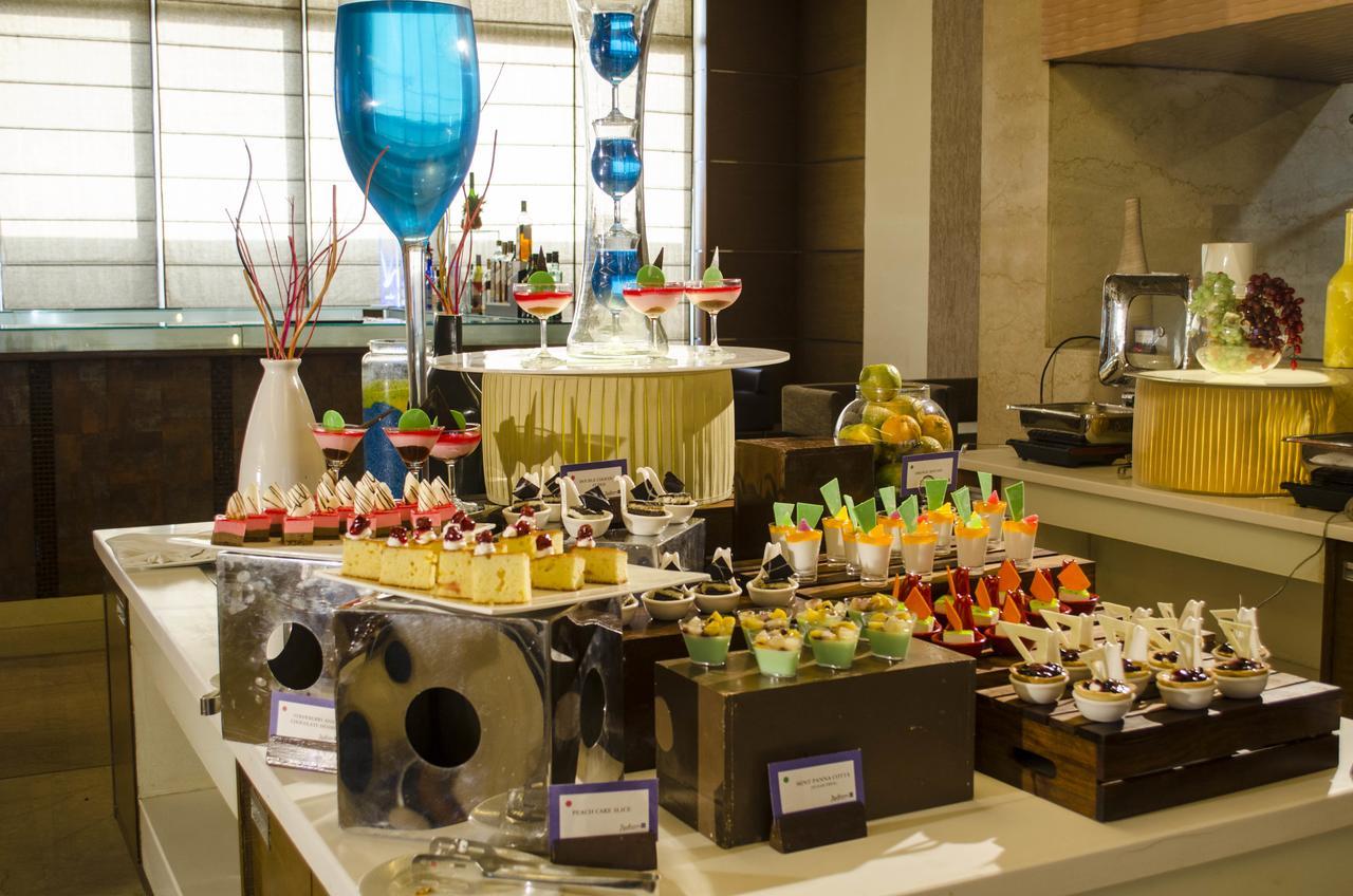 Radisson Blu Hotel, Greater Noida Bagian luar foto A dessert buffet